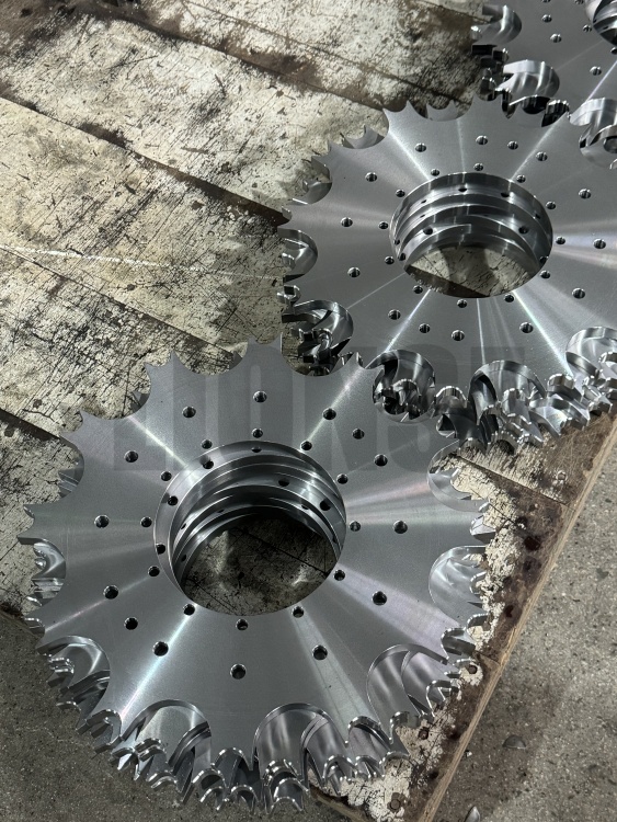 Cad é príomhfheidhm sprocket i dtrealamh meicniúil?