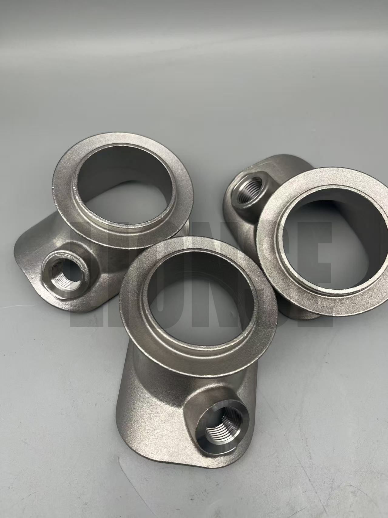Saincheaptha Infheistíocht Cruach Dhosmálta Cast Páirteanna CNC Machined